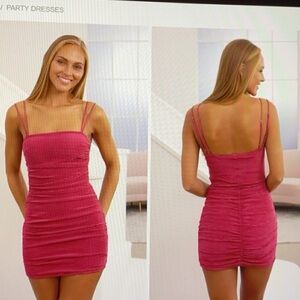 Lucy in the sky dress for hoco. Tight around the body snatching your waste.